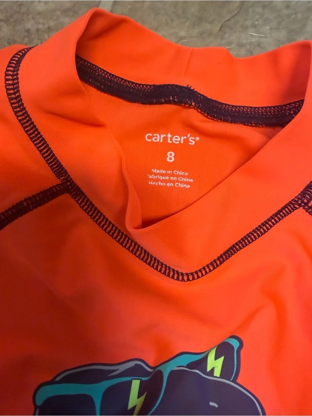 Carter's Bright Orange Kids Rash Guard with Navy Dino Graphic